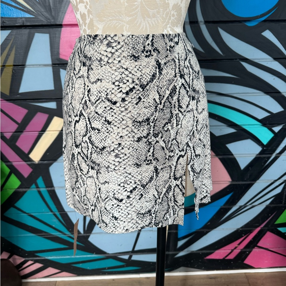 NWT Reformation high Slit mini skirt, size 4, $139